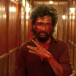 திரையரங்கில் திரைப்பட போஸ்டர்கள் காட்சி