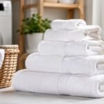 துணி துவைக்கும் இயந்திரத்தில் ப்ளீச் பாட்டில்