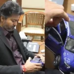 முதலமைச்சர் விஜய் பொம்மை காரை ஆர்வத்துடன் பார்த்தல்