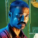 நடிகர் தனுஷ் மற்றும் அவரது திரைப்படங்கள் தேசிய விருது பெற்றதைக் குறிக்கும் புகைப்படம்