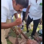 முன்னாள் அமைச்சர் சி.விஜயபாஸ்கர் விபத்தில் சிக்கிய காவலருக்கு முதலுதவி அளிக்கும் காட்சி