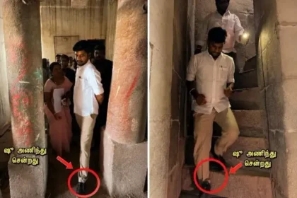 அமைச்சர் ரமேஷ் ஸ்ரீரங்கம் கோயில் கோபுரத்தை பார்வையிடும் காட்சி