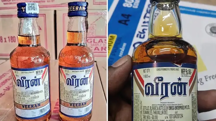 டாஸ்மாக் மதுபான கடையில் மதுபானங்கள் காட்சிப்படுத்தப்பட்டுள்ளன.
