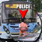 போக்குவரத்து காவலர் அரசு பேருந்தை தடுத்து நிறுத்துதல்