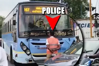 போக்குவரத்து காவலர் அரசு பேருந்தை தடுத்து நிறுத்துதல்