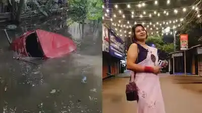 குளத்தில் மூழ்கிய காரை மீட்கும் மீட்புப் படையினர்