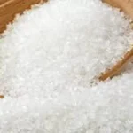 சர்க்கரை மூட்டைகள் அடுக்கி வைக்கப்பட்டுள்ள காட்சி
