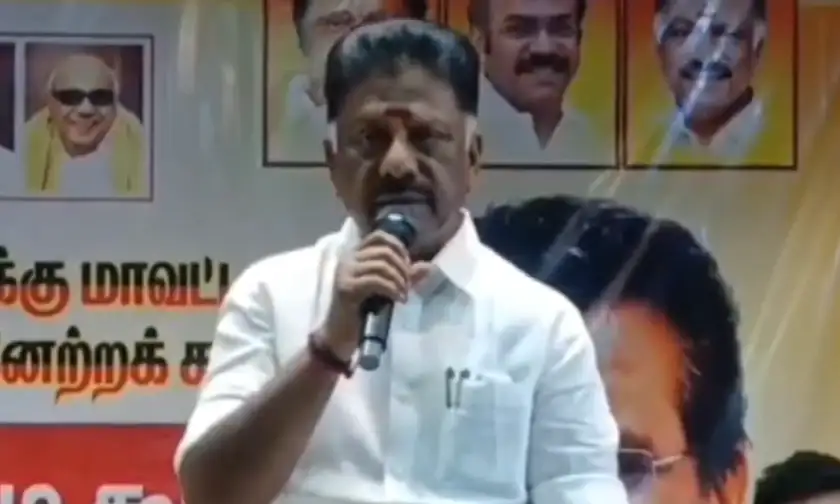 சாலை மறியலில் ஈடுபட்ட ஓ.பன்னீர்செல்வம் கைது செய்யப்படும் காட்சி