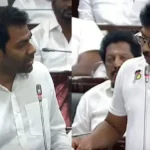தமிழ்நாடு சட்டசபையில் அமைச்சர் உதயநிதி ஸ்டாலின் மற்றும் சட்டமன்ற உறுப்பினர் ஆதவ் அர்ஜூனா விவாதிக்கும் காட்சி